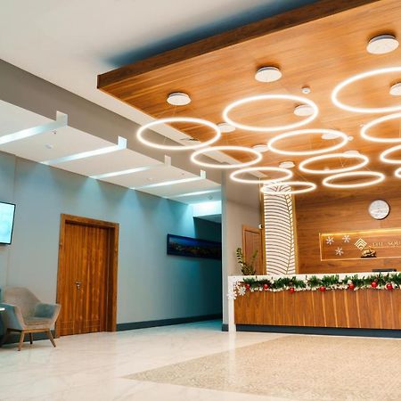 The Square Hotel Astana Bagian luar foto