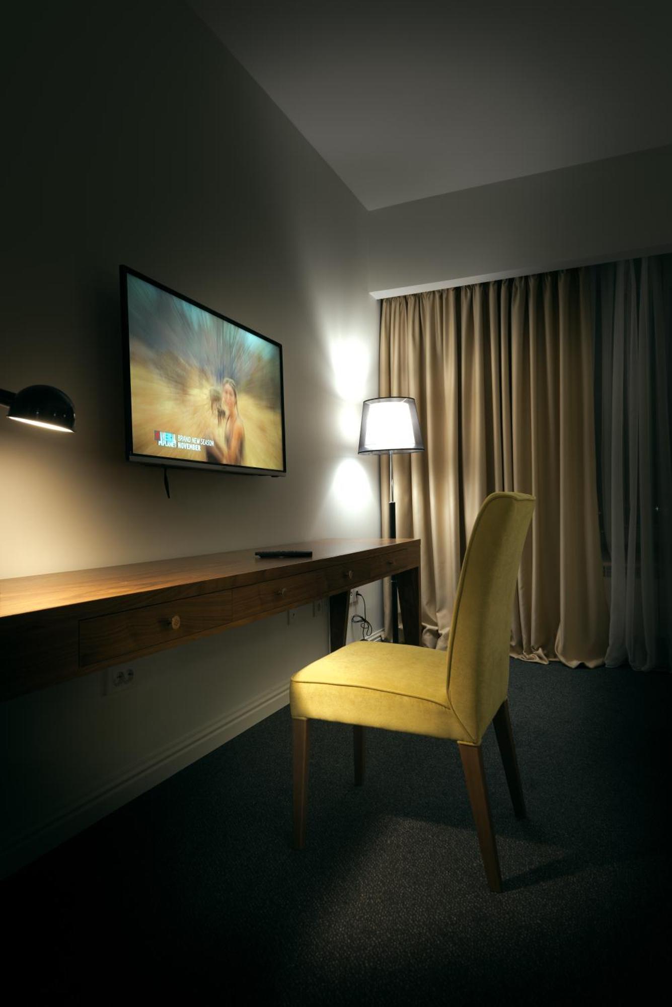 The Square Hotel Astana Bagian luar foto