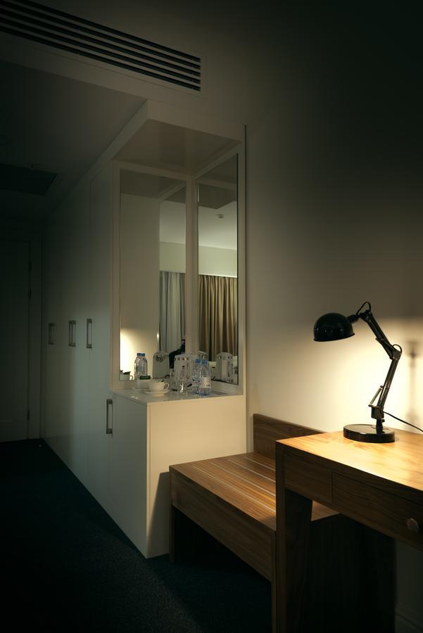 The Square Hotel Astana Bagian luar foto