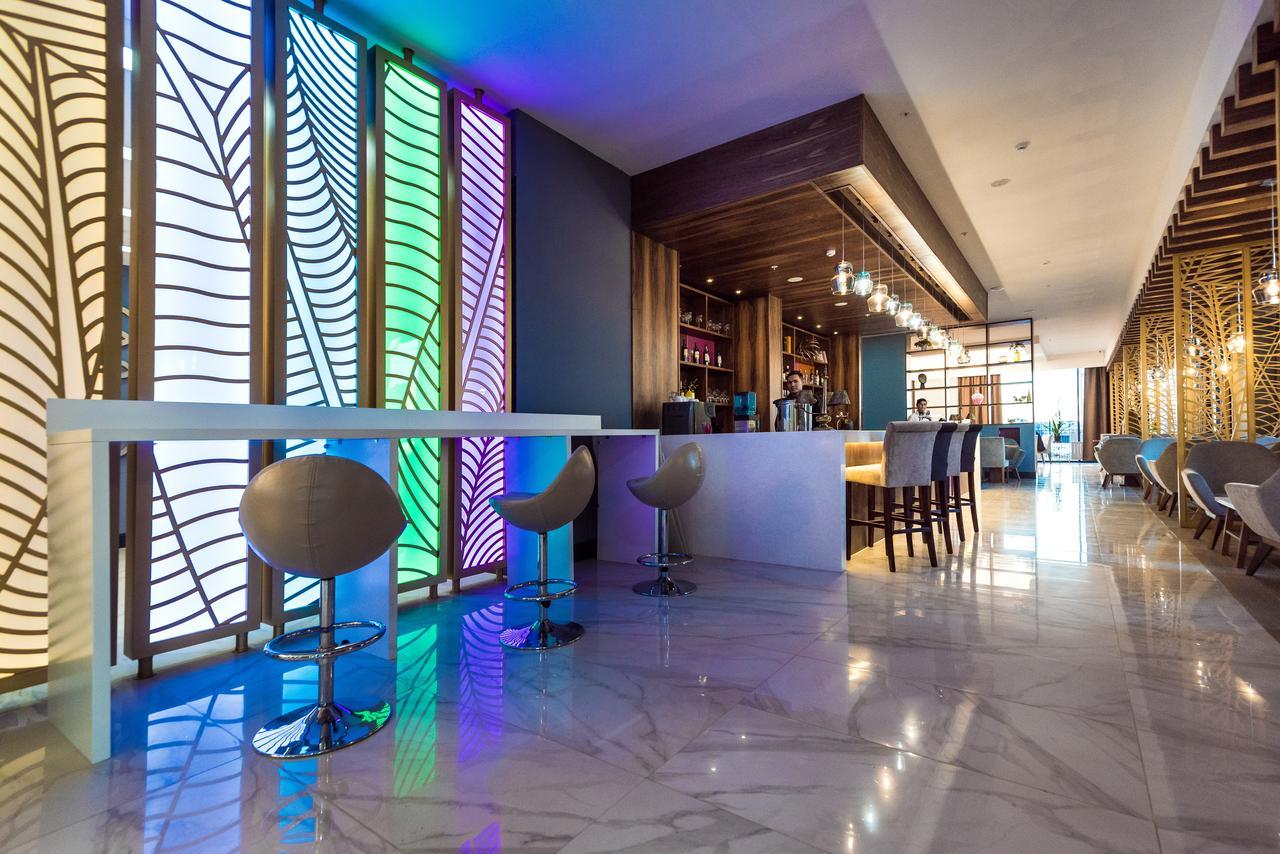 The Square Hotel Astana Bagian luar foto