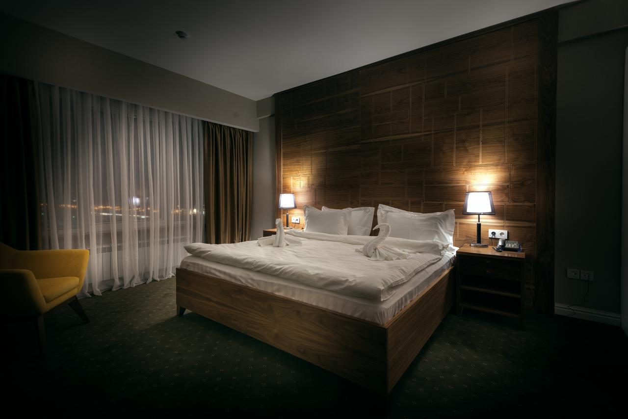 The Square Hotel Astana Bagian luar foto
