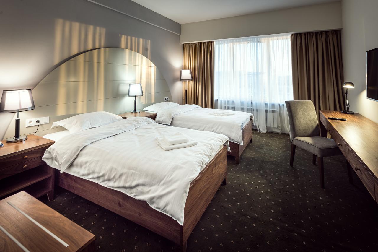 The Square Hotel Astana Bagian luar foto