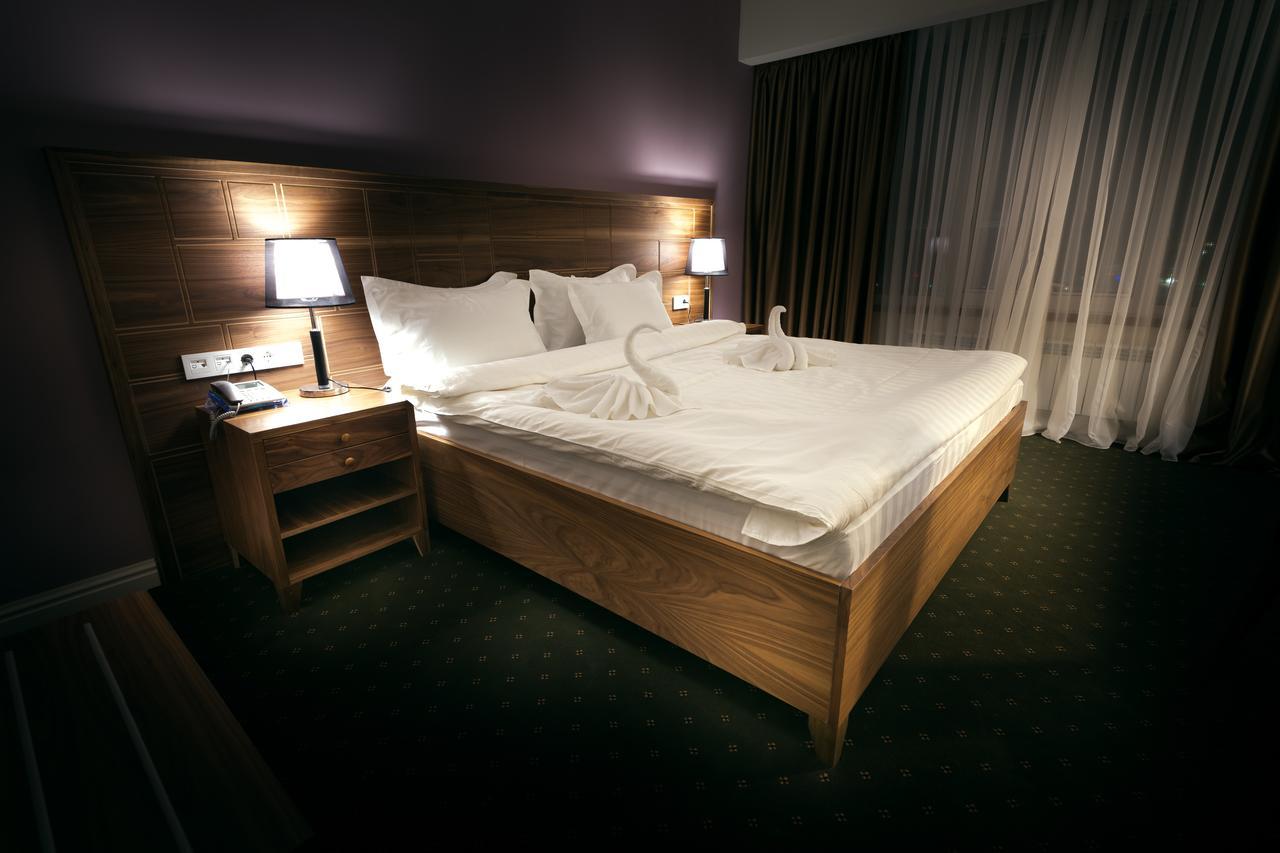 The Square Hotel Astana Bagian luar foto