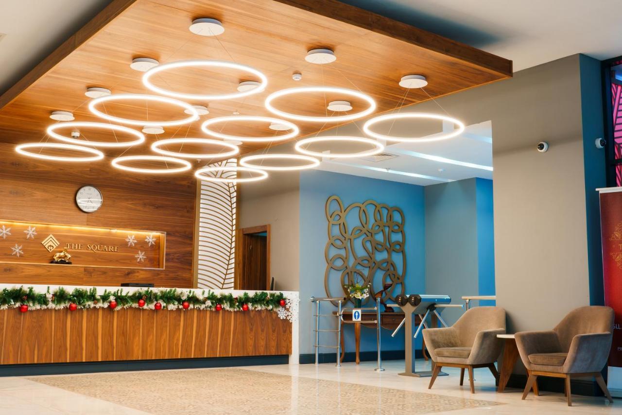 The Square Hotel Astana Bagian luar foto