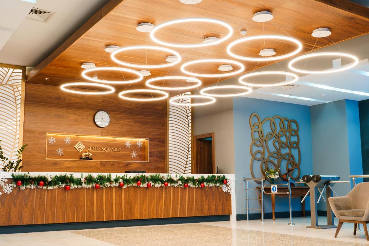 The Square Hotel Astana Bagian luar foto
