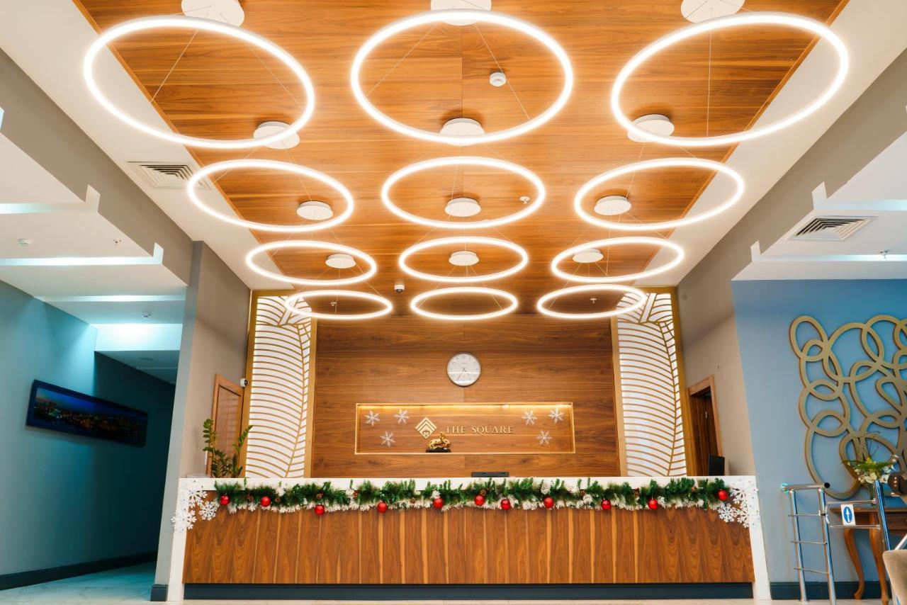 The Square Hotel Astana Bagian luar foto