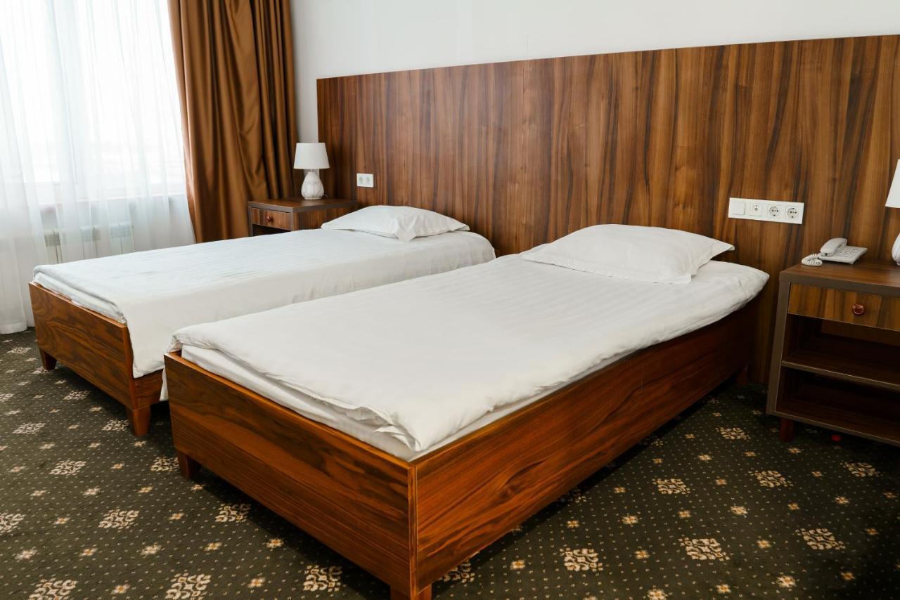 The Square Hotel Astana Bagian luar foto