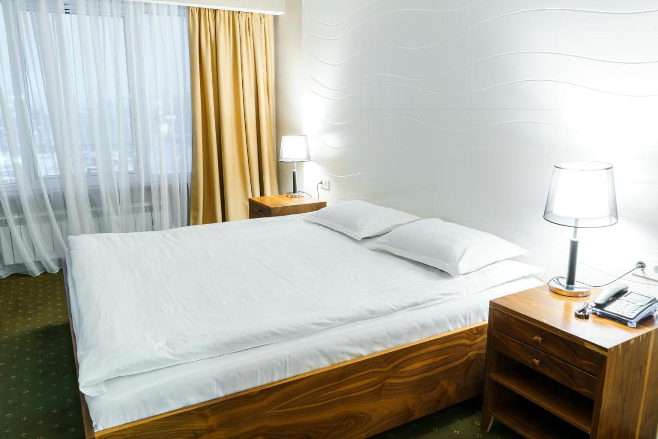 The Square Hotel Astana Bagian luar foto