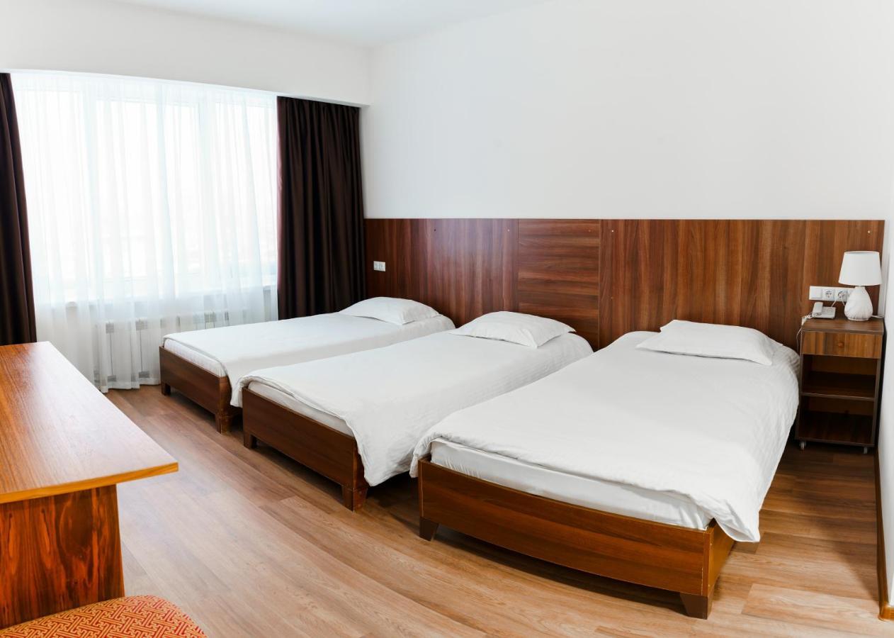 The Square Hotel Astana Bagian luar foto