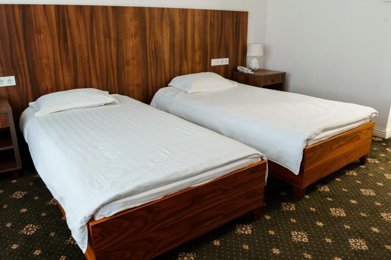 The Square Hotel Astana Bagian luar foto